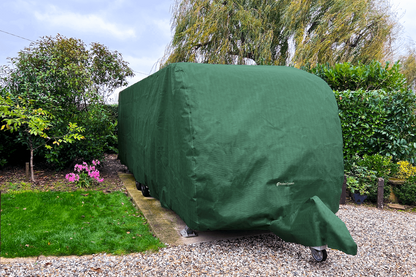 green full caravan and a frame cover